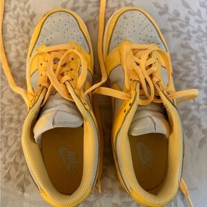 Women’s Nike Low Dunk Sneakers in Yellow and White